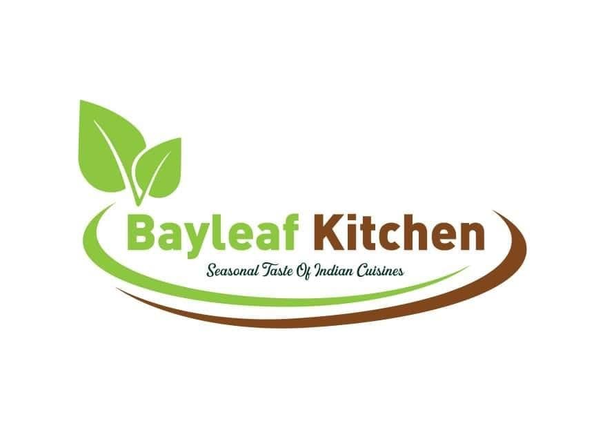 Custom green LED illuminated restaurant signage for Bayleaf Kitchen.